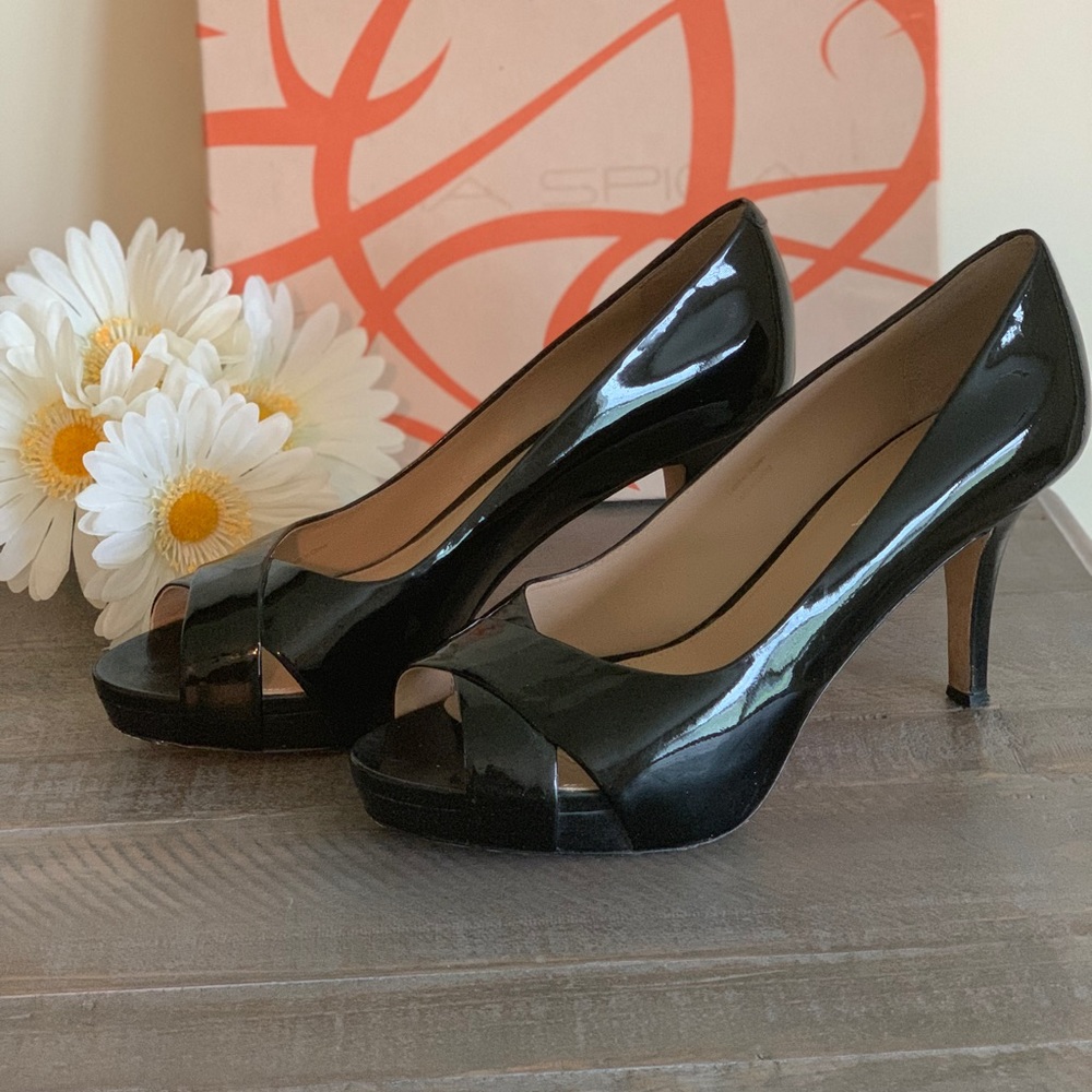 Via Spiga black patent leather heel.